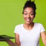 Why Hiring Offshore SDR Is The Key To Business Growth Offshore sales development representative (SDR) holding a laptop