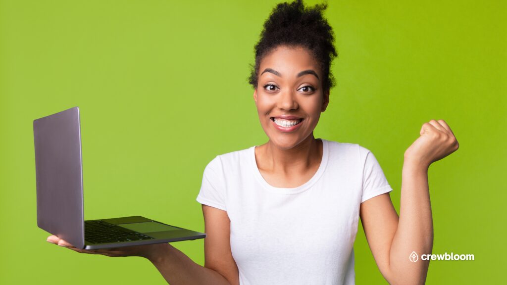 Offshore sales development representative (SDR) holding a laptop